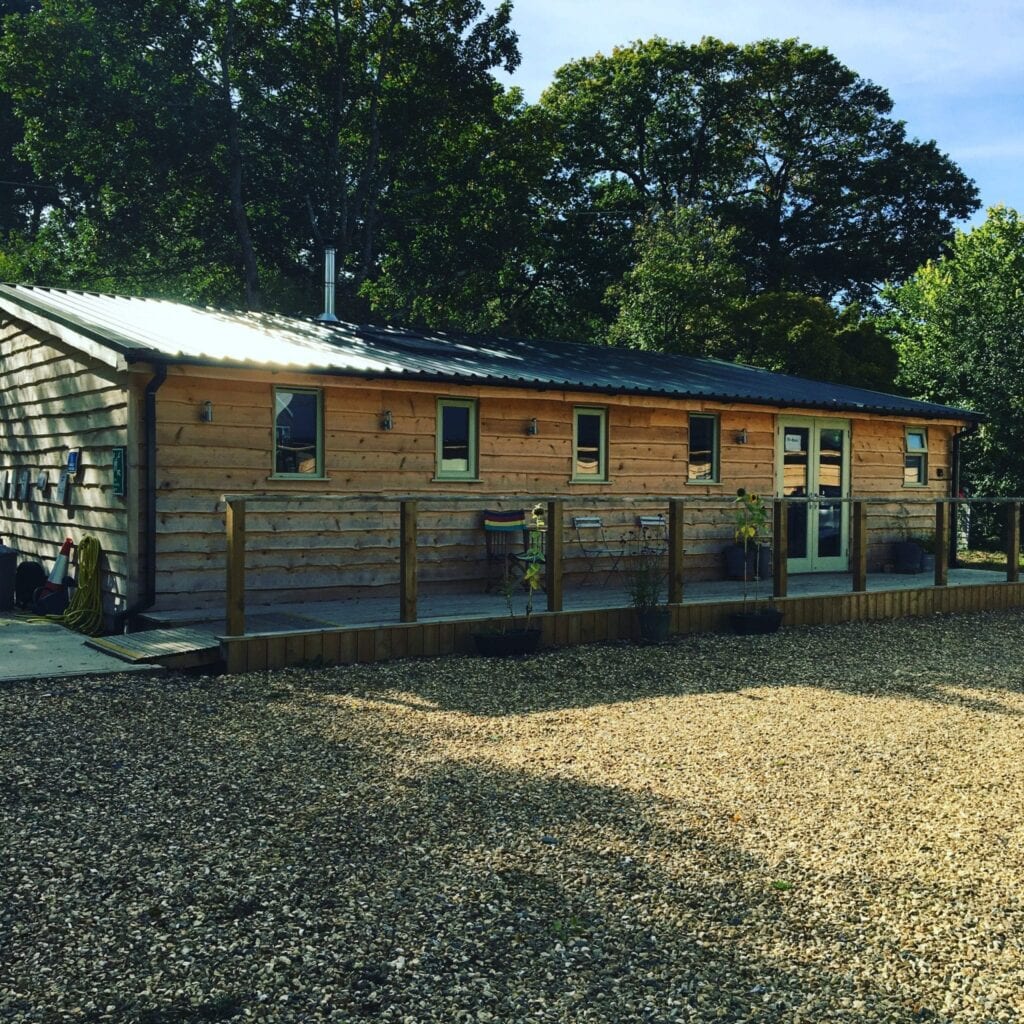 Tiny Homes Holidays - Eco-friendly lodges for off-grid vacations on the Isle of Wight, set in a natural meadow, adjacent to ancient woodland